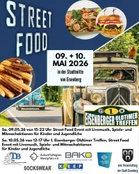 Ein Werbeplakat für ein Street Food Event in Eisenberg am 09. und 10. Mai 2026. Es zeigt Food-Trucks, leckeres Essen und Aktivitäten für Kinder und Jugendliche.